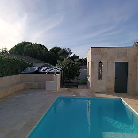 Charmant Studio Avec Piscine Villemoustaussou Kültér fotó