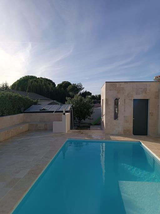 Charmant Studio Avec Piscine Villemoustaussou Kültér fotó